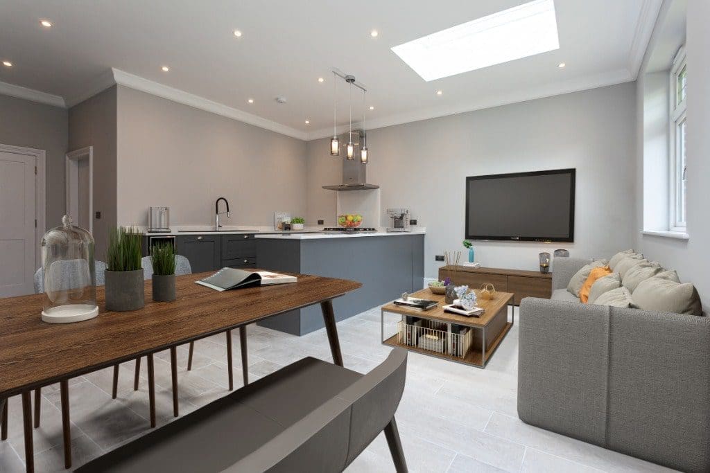 a living room filled with furniture and a flat screen tv.