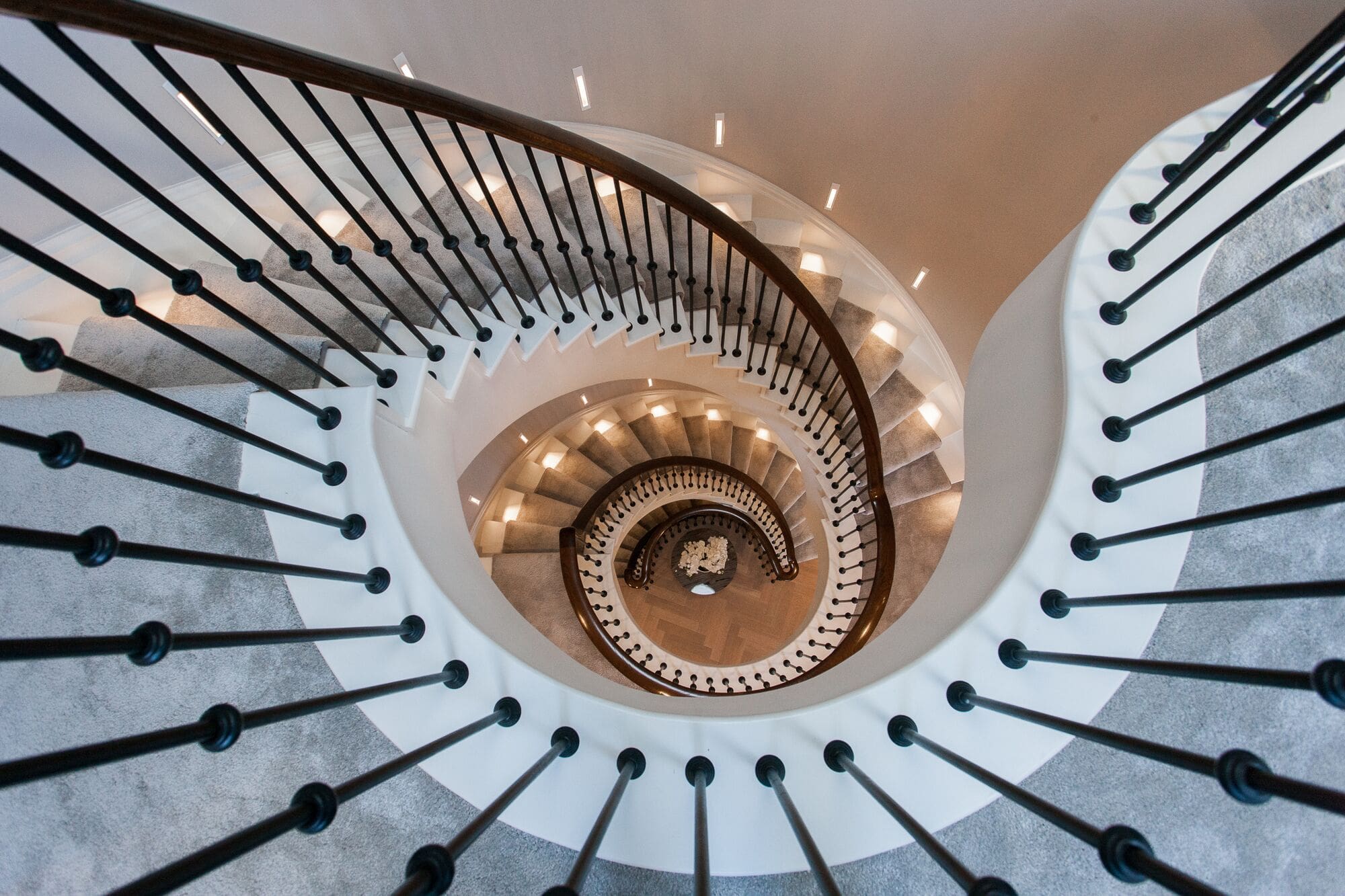 a view of a spiral staircase from the top.