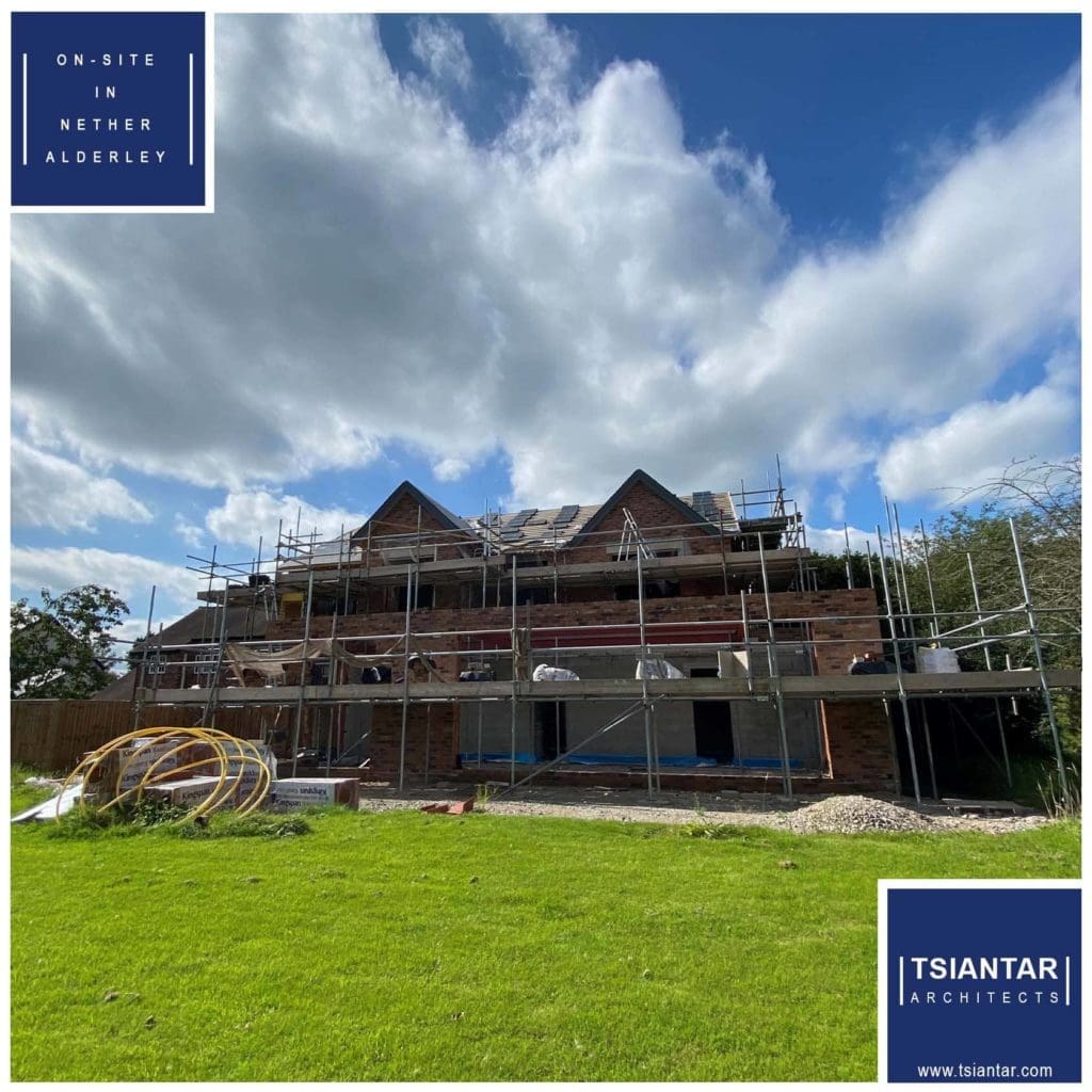 A Nether Alderley house under construction with scaffolding on-site.