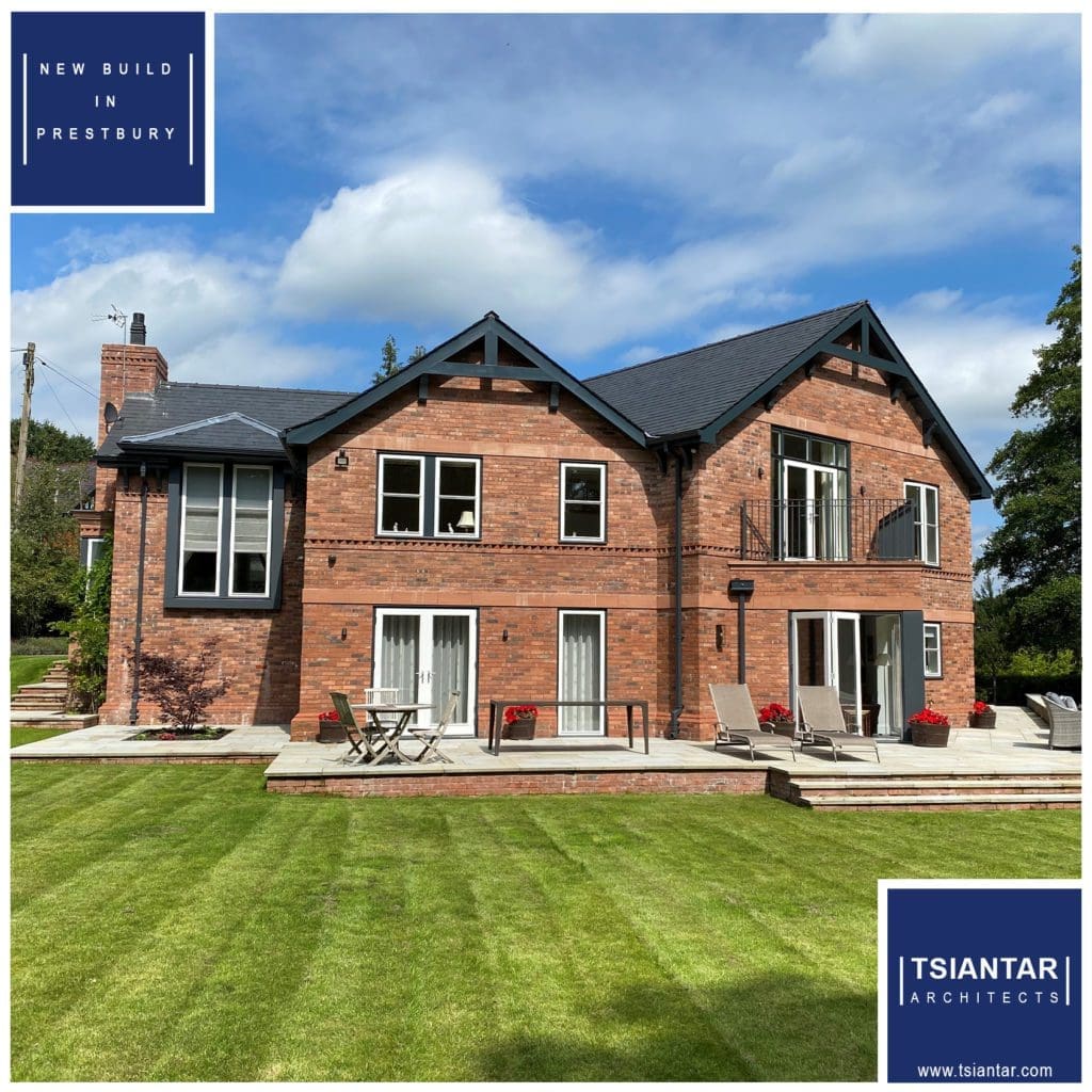 A red brick house with a green lawn in Cloverdale.