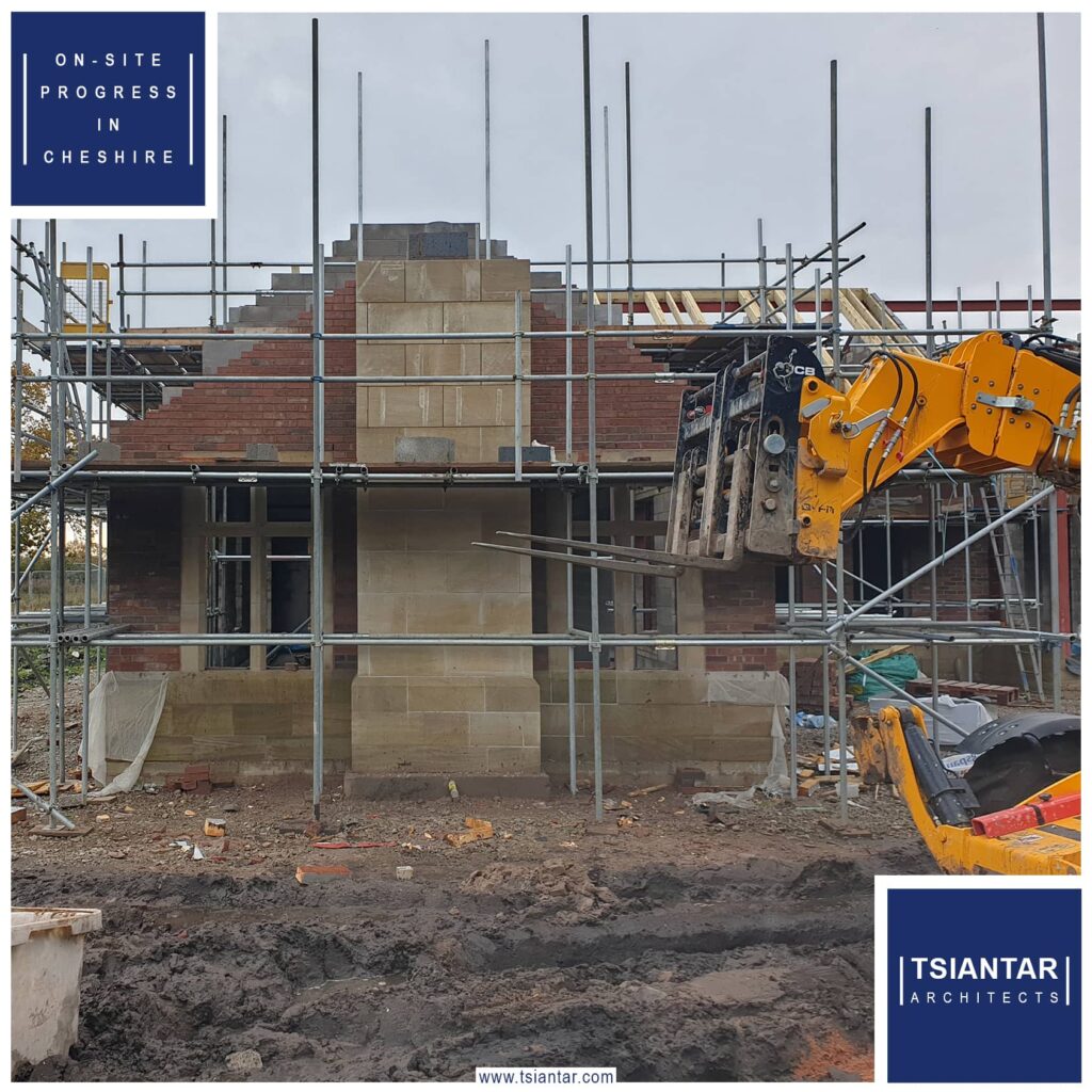 An image of an ON-SITE house being built with scaffolding.