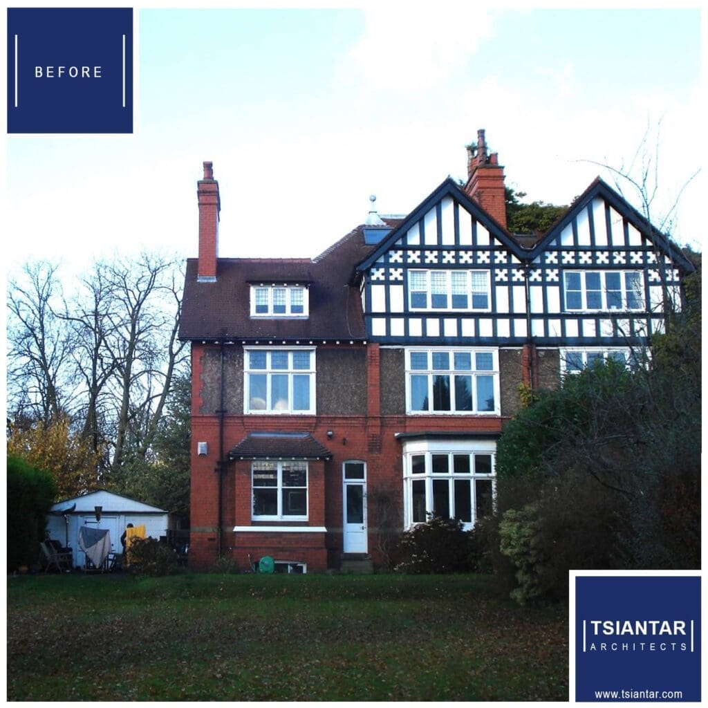 A house with a blue and white sign on it undergoing refurbishment.